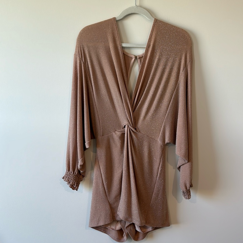 Nude Sparkly romper.